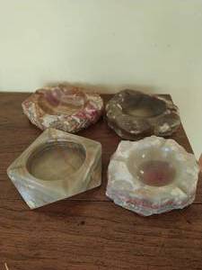 Four Carved Onyx Ash Trays