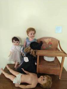 Four Antique Dolls and Childs Potty Chair