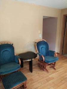 Two Rocking Chairs with One Ottoman