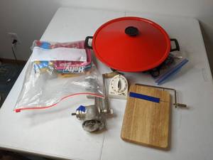 lot 109 image: Kitchen Items Electric Wok, Cheese Cutting Board, Timer, Silicone Ice Trays, Antique Meat Grinder