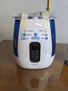 lot 399 image: HoMedics Humidifier and Holmes Tabletop Fan