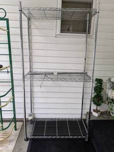 lot 377 image: Tall Metal Shelf on Wheels