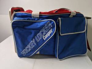 lot 142 image: Mixed Lot of Duffle Bags, Small Bags,  & Misc. Items Hockey Locker Cooper, Nike, Davidoff, Concourse