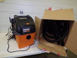 lot 151 image: Ridgid Wall Mount Shop Vac