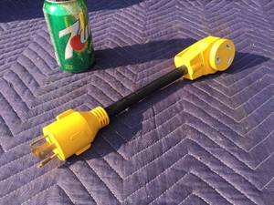 lot 61 image: Camco Power-Grip RV Power Adapter