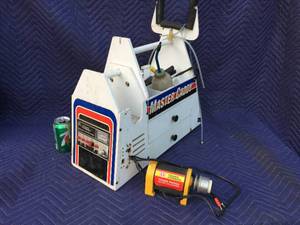 lot 67 image: Remote Control Master Caddy ChargingStarter Station