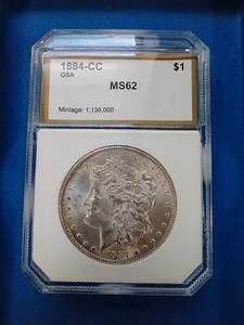 lot 25 image: 1884-CC Morgan - GSA Hoard - MS62 With COA & Box
