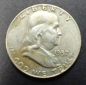 lot 69 image: 1957-D 90% Silver Franklin Half Dollar