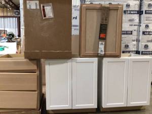 lot 21 image: Lot of assorted kitchenBathroom Cabinets Customer Returns See Pictures