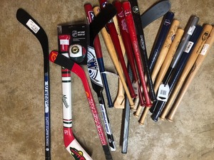 lot 78 image: mini bats and hockey sticks