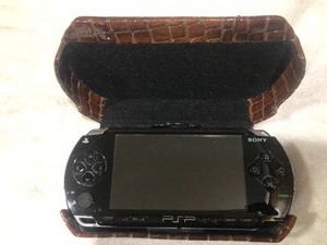lot 47 image: SONY PLAYSTATION PSP HANDHELD GAME