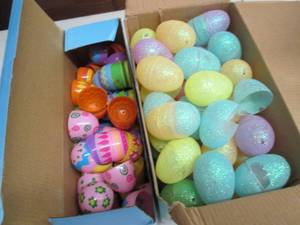 2 Boxes of Plastic Easter Eggs open...