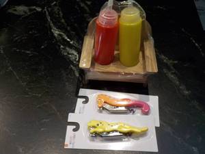 lot 133 image: Ketchup and Mustard Bottles in a St...