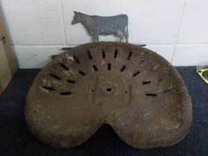 lot 244 image: Vintage Rusty Tractor Seat and Cow ...