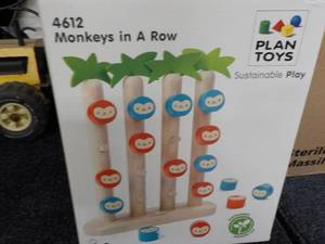 lot 214 image: Monkeys in a Row Wooden Toy...