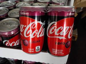 lot 299 image: 2 - 24 packs Coca Cola Cherry Zero ...