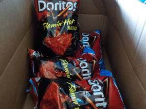 lot 319 image: Case of 4 Bags Dorito Flamin Hot N...