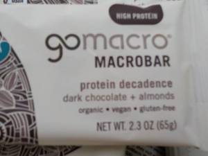 lot 332 image: 50- 2.4 oz Gomacro Protein Bars Dec...