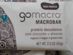 lot 334 image: 50- 2.4 oz Gomacro Protein Bars Dec...
