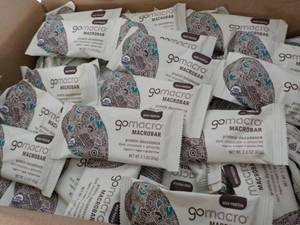 lot 335 image: 50- 2.4 oz Gomacro Protein Bars Dec...