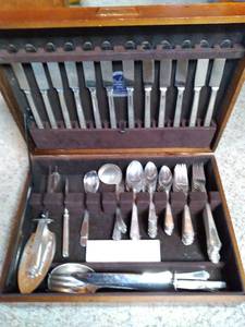 lot 14 image: Gorgeous M.I. Naken Co. Silverware Chest with Silverware Set 