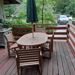 lot 157 image: Classic Outdoor Wood Patio Set with Umbrella, (4) Chairs, Etc. 