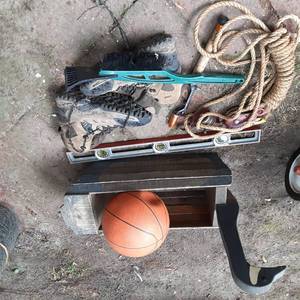 lot 219 image: Random Lot of Wooden Goose Shaped Outdoor Planter, Cabelas Boots, Wiper Blades, Ice Fishing, Scraper, Rope, and More 