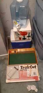 lot 234 image: Cooler, Glasses, Water Pitcher, Paper Cutter, Game 