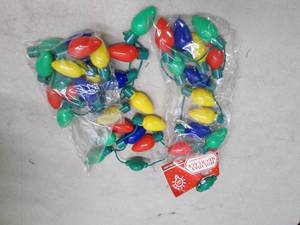 lot 30 image: 3 holiday light up necklaces open b...