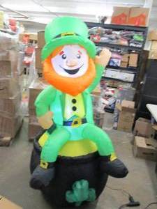 lot 89 image: 6ft tall st.patrick sitting leprech...