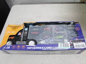 lot 129 image: truck toy with 6 pull back metal ca...