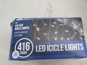 lot 215 image: 416 led icicle lights power on open...