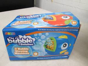 lot 311 image: bubble solutions 2 blowing machines...
