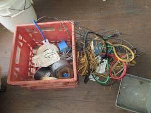 lot 32 image: milk crate with bungie cords, twine...