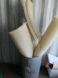lot 35 image: metal garbage can and rough white p...