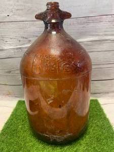 lot 14 image: 1 Gallon Antique Glass Jug