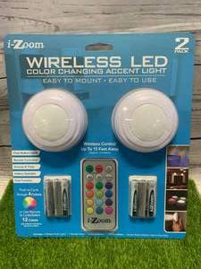lot 26 image: Wireless Multi Colored Puck Lights