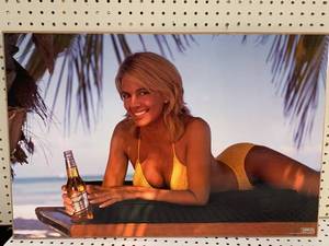 lot 58 image: Vintage 1996 Miller Genuine Draft Advertising on Wood 20 x 30