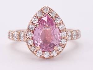 lot 4 image: Breathtaking 3.03 Carat Natural Bubblegum Pink Sapphire and Diamond Halo Estate Ring in 18k Rose Gold $6,250 Retail