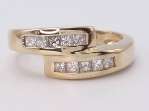 lot 22 image: Bypass Style Princess Cut Channel Set Diamond Ring in 14k Yellow Gold