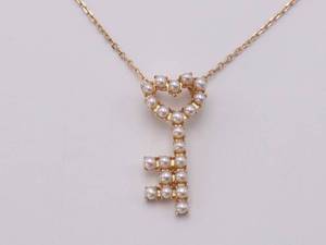 lot 53 image: 21 Seed Pearl Key Pendant Necklace in 14k Yellow Gold