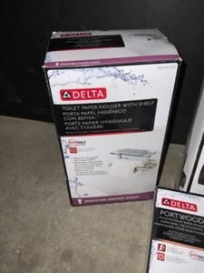 lot 15 image: Delta Porter, Portwood & Lahara Collection Toilet Paper Holders, Towel Bars & Robe Hooks. See Pictures