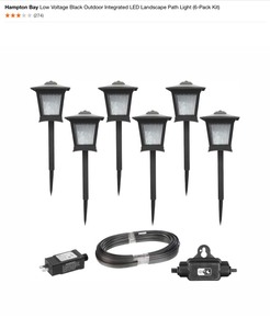 lot 44 image: Hampton Bay Low Voltage Black Outdoor Integrated LED Landscape Path Light (6-Pack Kit) & Hampton Bay 15 Lumens Gray Solar LED Path Light Set with Vintage Bulb (4-Pack). See Pictures