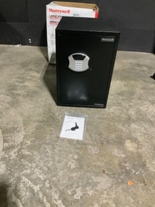 lot 27 image: Honeywell 2.87 cu. ft. Large Storage Capacity Steel Security Safe with Programmable Digital Lock. See Pictures