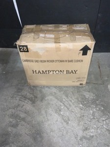 lot 14 image: Hampton Bay Cambridge Gray Wicker Outdoor Patio Ottoman with CushionGuard Chalk White Cushions. See Pictures