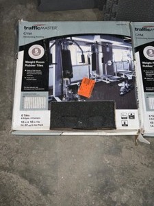 lot 19 image: Various Kinds & Colors of Trafficmaster Interlocking Gym & Exercise Flooring. Various Conditions. See Pictures
