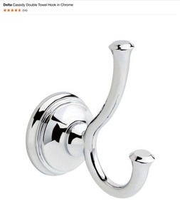 lot 33 image: Delta Cassidy Single Post Toilet Paper Holder, Robe Hooks, Towel Rings, Towel Bars & Zenna Shower Caddy. See Pictures