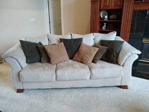 lot 11 image: Ashley Furniture Faux Suede Couch