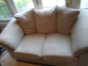 lot 12 image: Ashley Furniture Faux Suede Loveseat