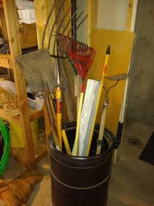 lot 253 image: Barrel of Yard Tools